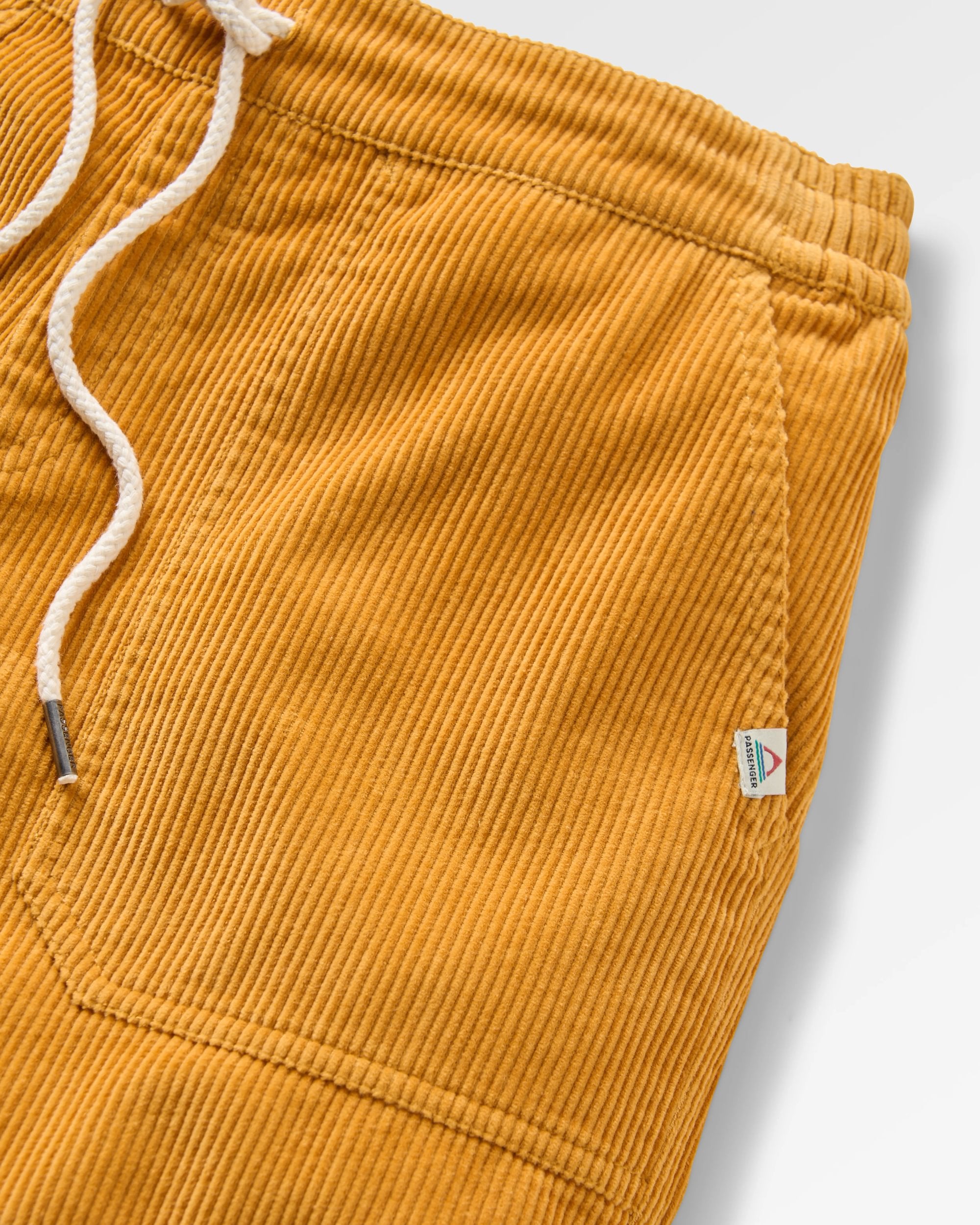 Avian Organic Cord Short 2.0 - Spruce Yellow - Flatlay